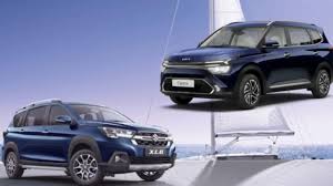 Maruti XL6 Vs Kia Carens: इंजन, फीचर्स और कीमत के मामले में किस एमपीवी को खरीदना है बेहतर
